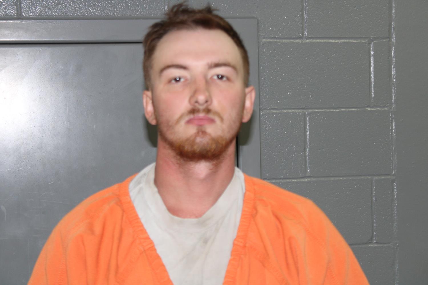 Booking photo of Cain Joseph Mcdow