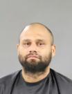 Booking photo of Christopher Edward Simpson