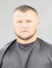 Booking photo of Dustin Allen Cox