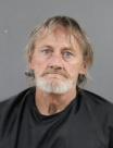 Booking photo of James Allen Busby