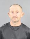 Booking photo of James Dustin Henry