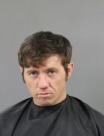 Booking photo of Justin Brian Everett