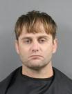 Booking photo of Justin Dwain Harris