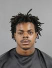 Booking photo of Qua'Thaddeus Kiontae Nyzeus Thompson