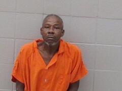 Booking photo of Derek Perkins
