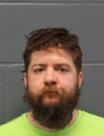 Booking photo of TRAVIS JOSEPH HUNT