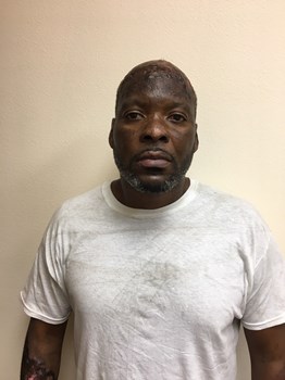 Booking photo of John Combs