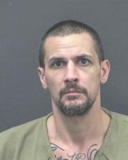 Booking photo of Joel Symons