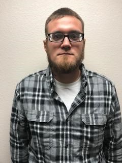 Booking photo of Justin Leslie