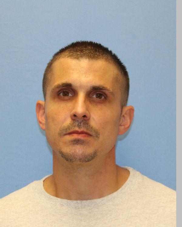 Booking photo of Aron Buelteman