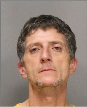 Booking photo of Bradley Cooper