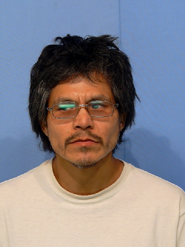 Booking photo of Adrian Comenout