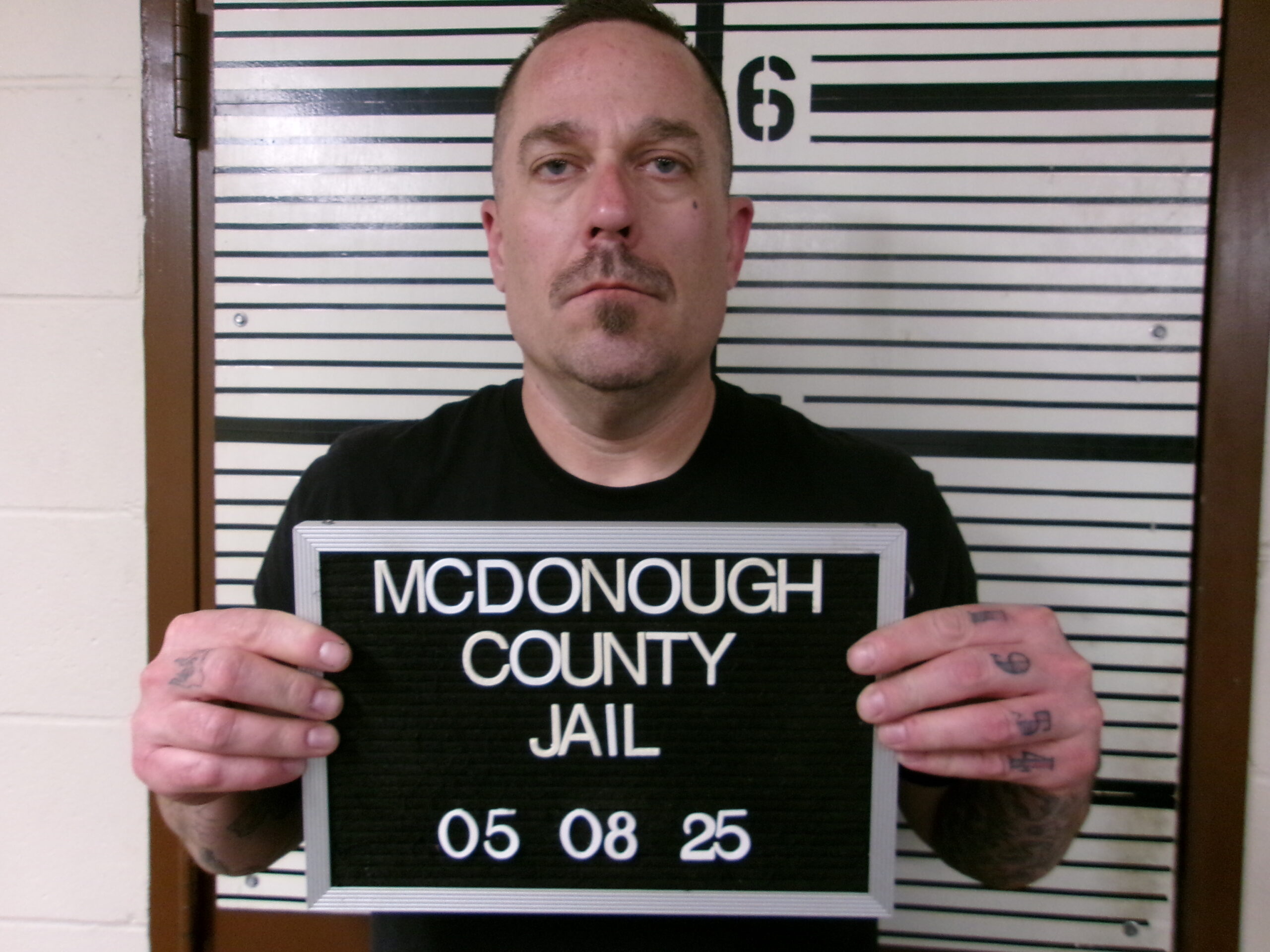Booking photo of Chris Mainland