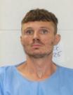 Booking photo of JUSTIN E ARD