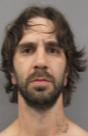 Booking photo of Dustin Lee Jones