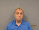 Booking photo of Tyler Ray Manbeck