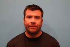 Booking photo of John Grueneich