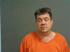 Booking photo of Adam Norton