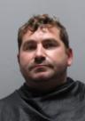 Booking photo of Aaron Clark Chapman