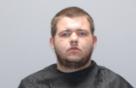 Booking photo of Adam Jacob Markham