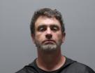 Booking photo of Derek Russell Sanders