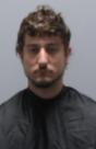 Booking photo of Erik Roger Keith Roach