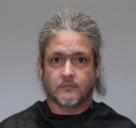 Booking photo of Justin Davis Flores