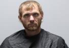 Booking photo of Justin Lee James Baker