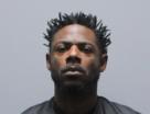 Booking photo of Travis Antonio Mansell