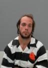 Booking photo of Christopher Allen Rhoton