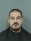 Booking photo of Justin Lee Britton