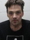 Booking photo of Derek T Adams