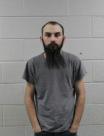 Booking photo of Logan Andrew Barton
