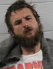 Booking photo of Aaron K Coggins
