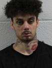 Booking photo of Ryan Austin Harvey