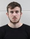 Booking photo of Toby J Howell
