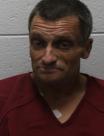 Booking photo of Justin Brad Taylor