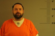 Booking photo of AARON LEE CAROW